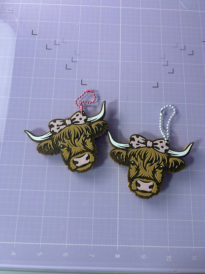 3-D printed Highlander cow can opener keychain